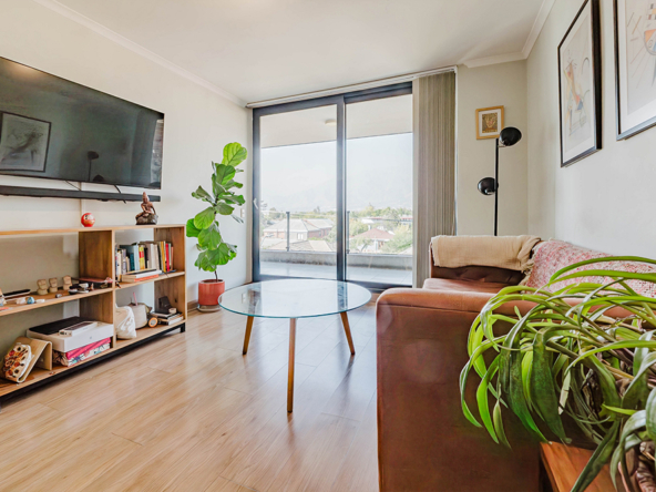 Departamento en Macul, cerca de la Municipalidad de Macul, con vistas despejadas a la cordillera y 2 estacionamientos